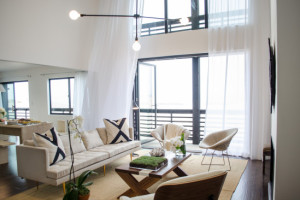 An all-white palette directs the focus to the scenery outside.