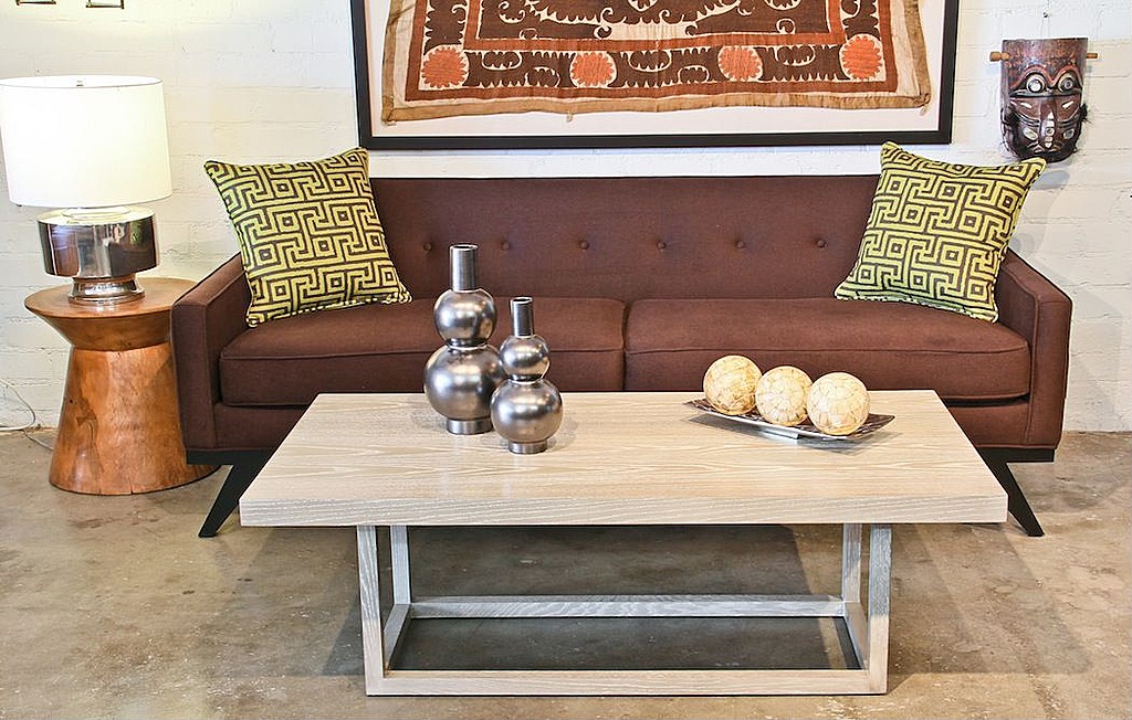 A mid-century-style coffee table can be a room's statement piece.